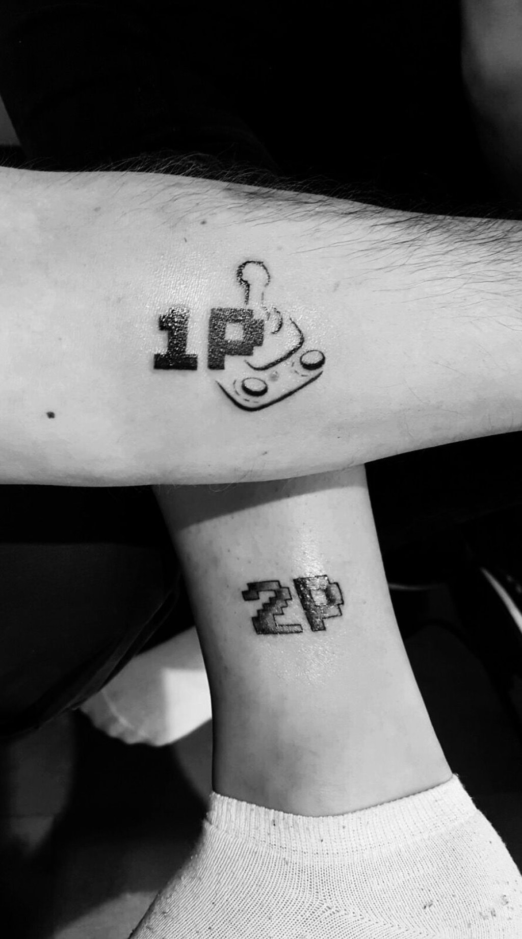 Picture of: Matching game tattoos of my brother and I